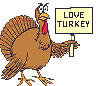 Thanksgiving turkey holding an Eat Fish! sign.